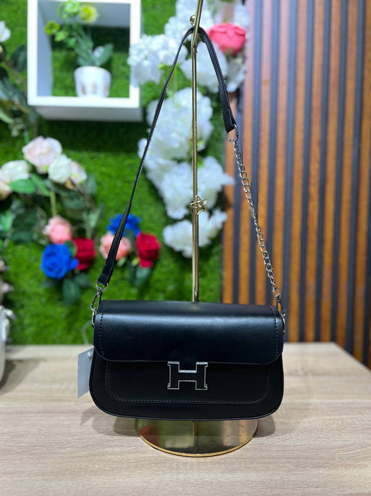 Pochette “H” — L’élégance dans sa plus belle simplicité